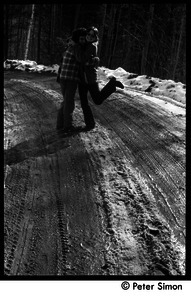 Verandah Porche (right) and Rico (Richard Wizansky) hugging on a dirt road, Packer Corners commune