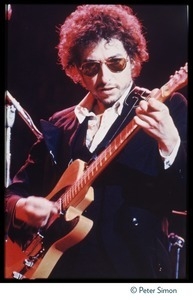 Bob Dylan playing electric guitar