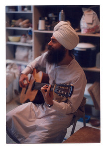 Gurushabd Singh playing guitar