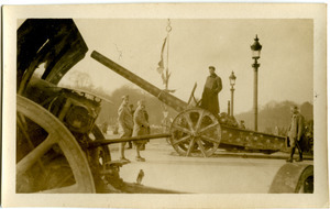 American soldiers standing among German artillery pieces