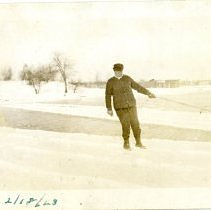 Men cutting ice with machinery