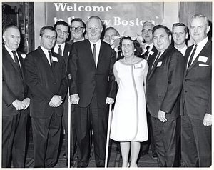 Mayor John F. Collins and Mary Collins with unidentified men at local reception