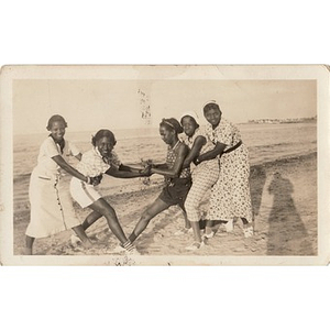 Inez Irving and friends play on the beach