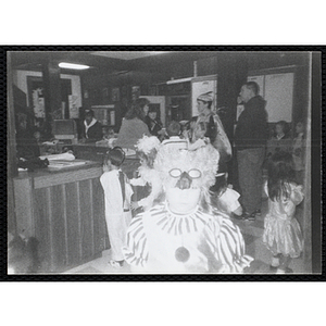 A girl poses in her costume during a Halloween event