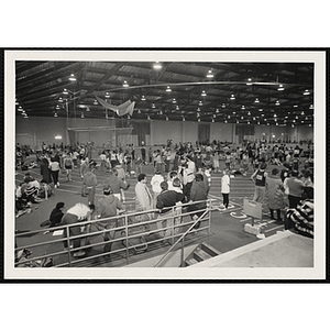 Athletes and spectators gather at the Red Auberbach 3x3 Tournament track meet