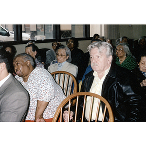 View of seated audience during a Chinese Resident Association meeting