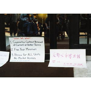 Protest signs during demonstration for affordable housing