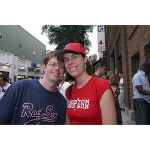 Meghan Eliason and another pose together outside Fenway Park