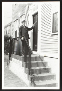 Full-length portrait of William Sumner Appleton, standing, facing three-quarters to the right, 18 Union Street, Nantucket, Mass., 1937