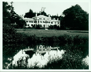 Exterior view of the front of Lyman Estate, Waltham, Mass., from across grounds and pond.