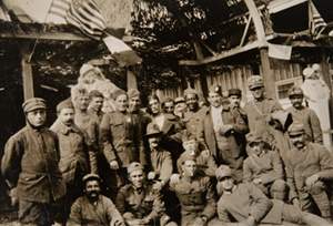 Large group of soldiers standing outside a canteen