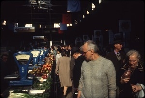Row of produce tables at market