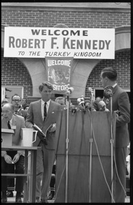 Walter Mondale at the podium, introducing Robert F. Kennedy to the Turkey Day festivities