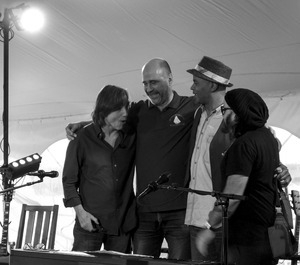 Jackson Browne, John Hall, Guy Davis, and unidentified musician at the Clearwater Folk Festival