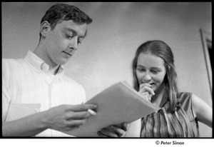 United States Student Press Association Congress: Robert A. Gross looking at a document with an unidentified woman