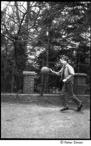 Peter Simon dribbling a basketball