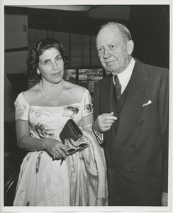 Jeremiah Milbank, Sr. with an unidentified woman in formal dress at Institute Day