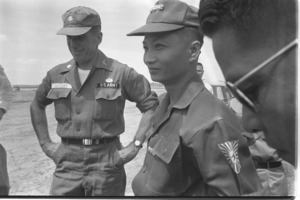 Vietnamese Colonel Cao Hao Hon, commander of the 25th Infantry Division at Bac Lieu with U.S. military advisor; Bac