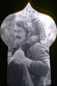Dick Whiting with child on shoulders