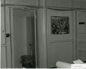 Photograph of the outside of the ladies room, [1982-1983].