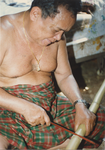 Basket Making: Em Yung cuts the bamboo pole, 1987