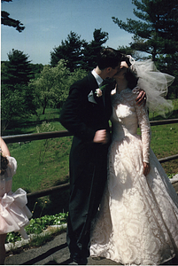 Ed and Shirley Silva kissing on wedding day