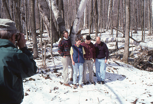 Norman E. Borlaug field trip to the Hopkins Memorial Forest. 7. Photograph being taken of (left to right: Permanent Plotters Henry W. Art, Emilie Grossmann (Class of 1996), Norman E. Borlaug (U MN, Class of 1937), and Peter McChesney (Class of 1975).