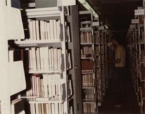 Student in the Stacks.
