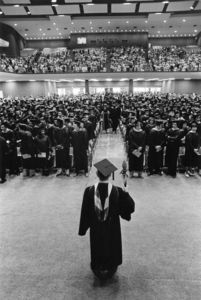 Students standing at Suffolk University's 1976 commencement