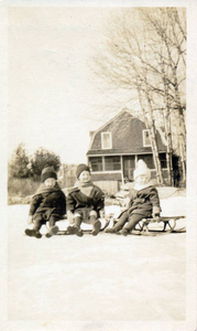 Three on a sled, winter 1928