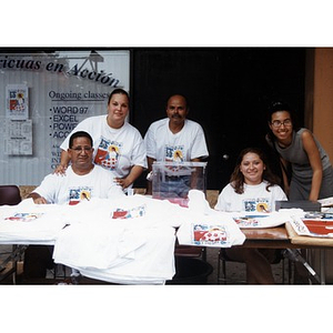 Festival Betances staff selling t-shirts at the festival.