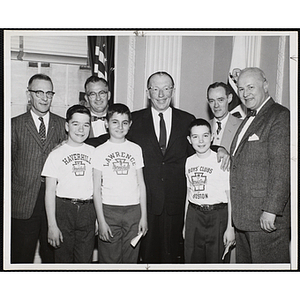 Lt. Governor Robert F. Murphy (center) and Executive Director of Boys' Clubs of Boston Arthur T. Burger (far right) along with three unidentified men pose with three boys