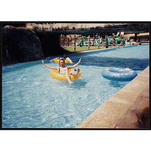 A girl rides in an intertube at the Water Country water park during a Tri-Club field trip