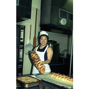 Baker at Andy's Garment Workers Food Service Graduation