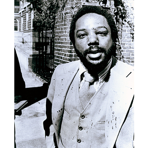 Head and shoulder portrait of assault victim, Theodore C. Landsmark after being attacked by anti-busing protestors