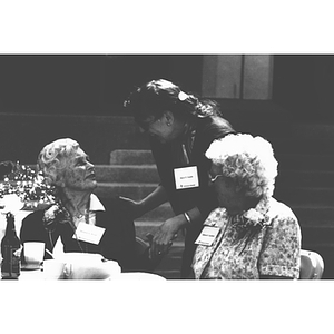 Joyce E. Lunde speaks with Marjorie G. Prout and Mildred C. Garfield at the Century Fund luncheon