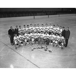 The 1966 Northeastern men's hockey team poses together on the ice