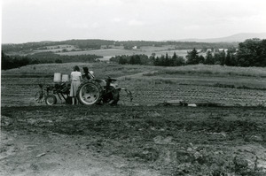 Tractor working a field in Vermont