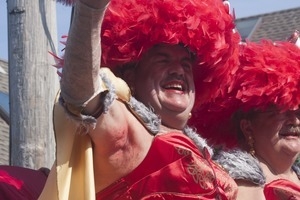 Float with The Hat Sisters, Tim O'Connor waving to the crowd : Provincetown Carnival parade