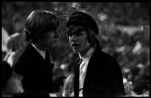 Beatles concert at Shea Stadium: boy fans in fashionable attire