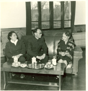 Shirley Graham Du Bois seated with two Chinese officials