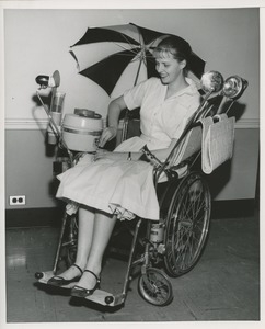 Woman in specially equipped wheelchair