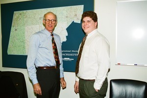 Congressman John W. Olver with visitor, in his congressional office