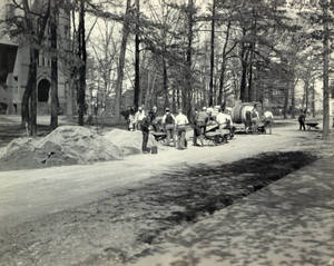 Building a sidewalk in front of Judd Gymnasium, ca. 1921