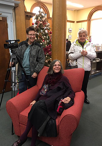 Waiting for the holiday band concert at the library. Cathy Stacy, Phyllis Poor,