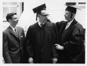 Student and Faculty Member in Commencement Robes, 1958