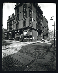 Building on west side Ash Street corner Oak Street