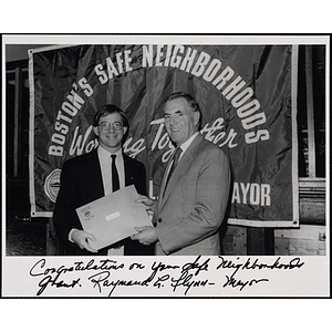 Mayor Raymond L. Flynn presents the Boston's Safe Neighborhoods Grant to Jerry Steimel, Charlestown Boys and Girls Club Director