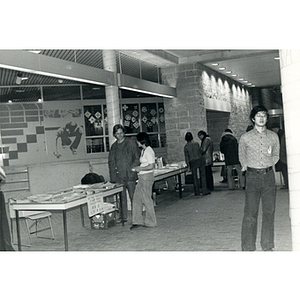 Guests browse in the lobby of the Josiah Quincy School while attending a program about the normalization of U.S. and China relations