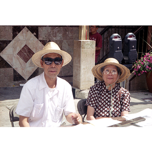 People distributing information at the August Moon Festival